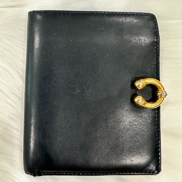 Gucci Handbags - Gucci black leather wallet with gold hardware
